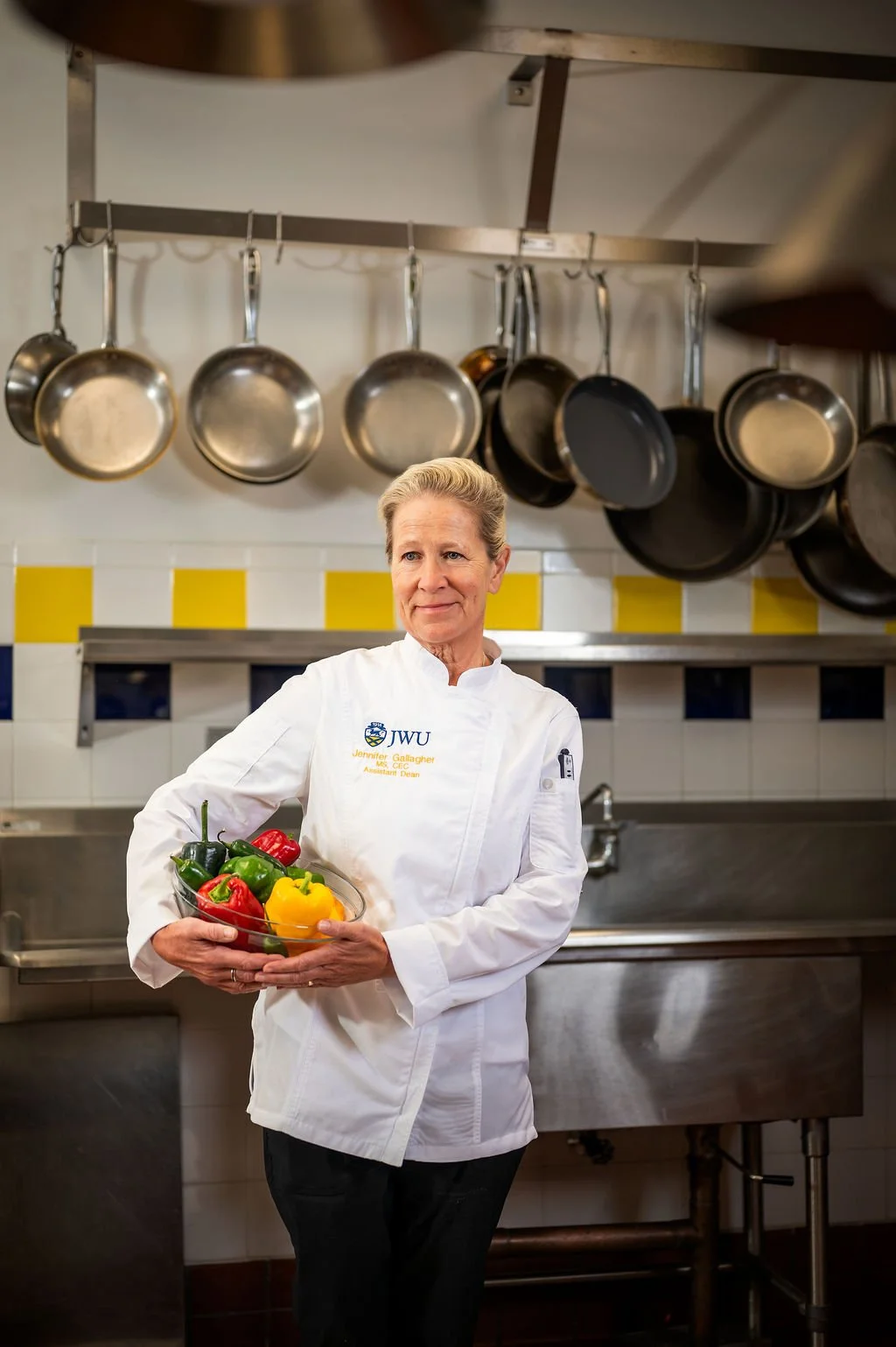 Professional environmental portrait of a chef in a commercial kitchen at Johnson & Wales University in Charlotte, NC.