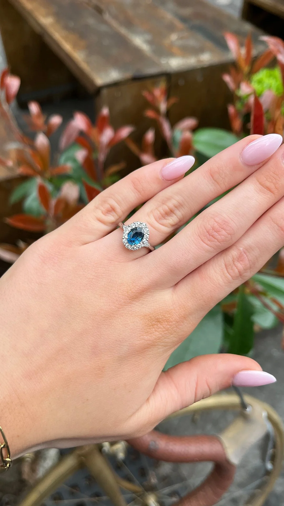 Oval engagement ring worn on the hand