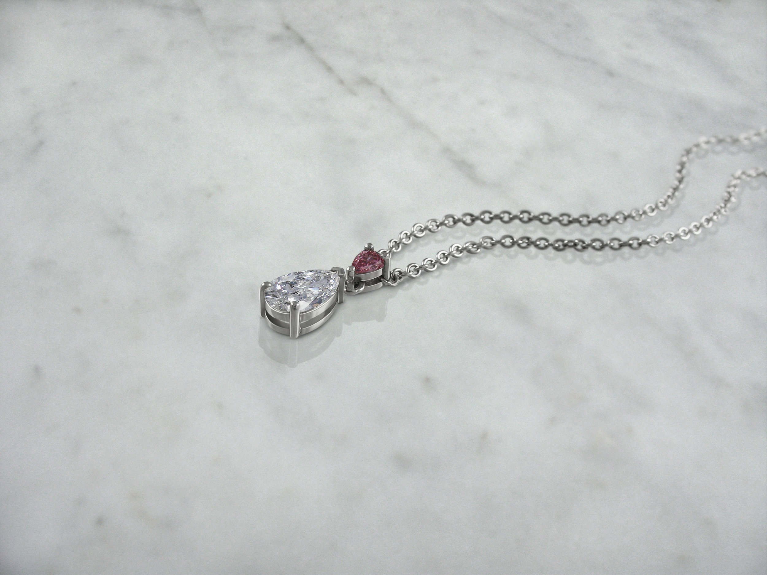 Pear shaped pink diamond and diamond pendant from the Fiorella collection