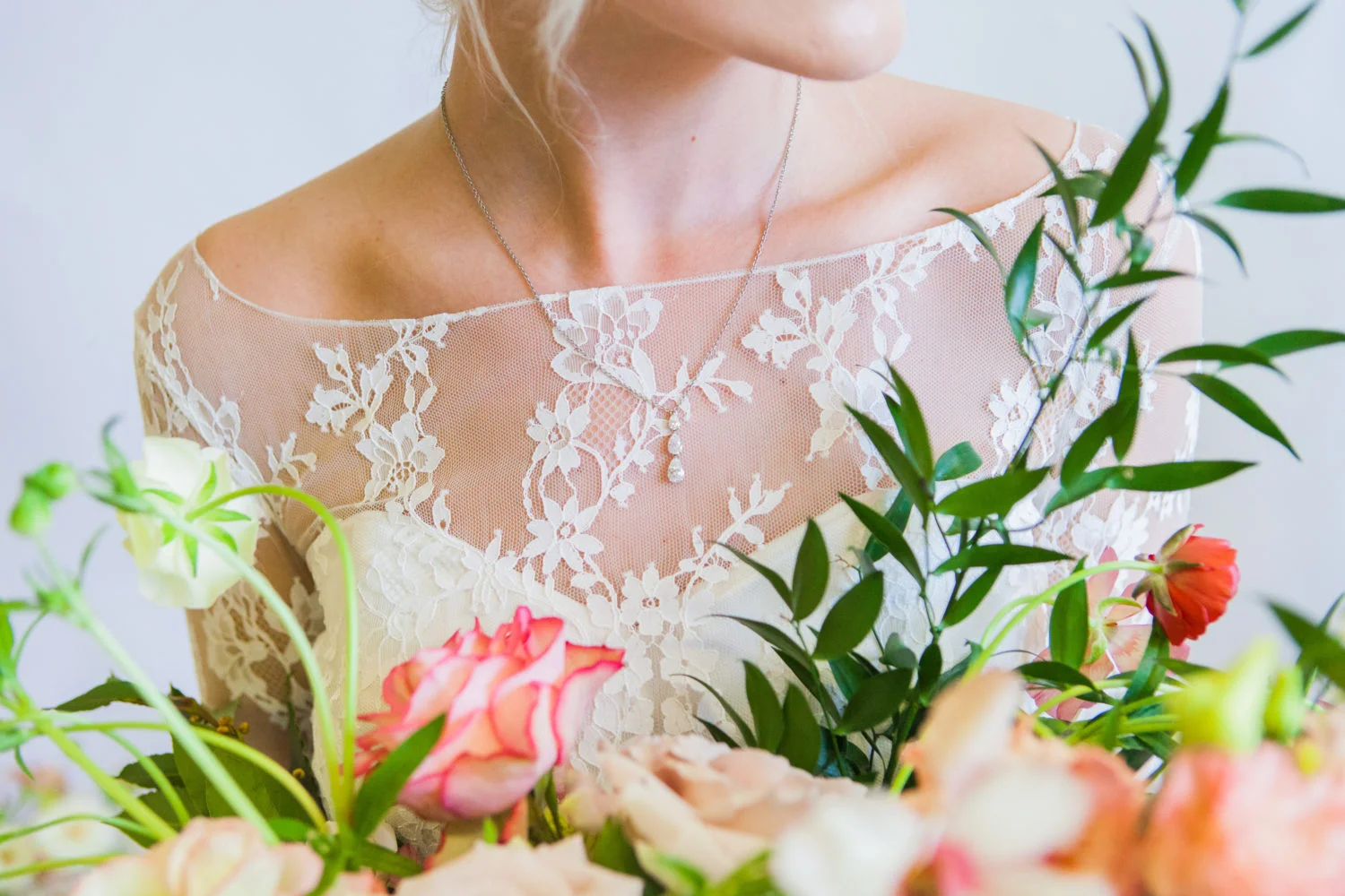 Bride with diamond pendant necklace