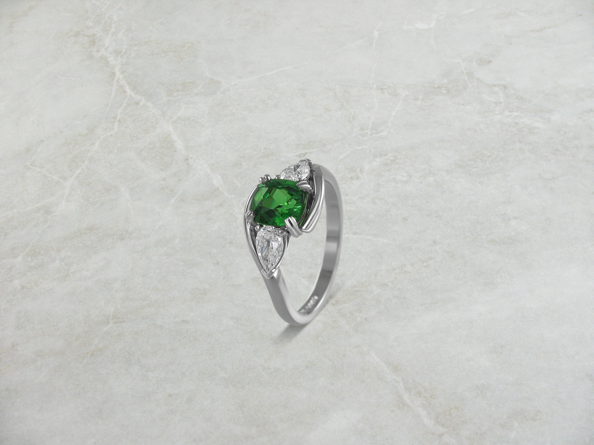 Tsavorite and pear shapes diamond trilogy ring