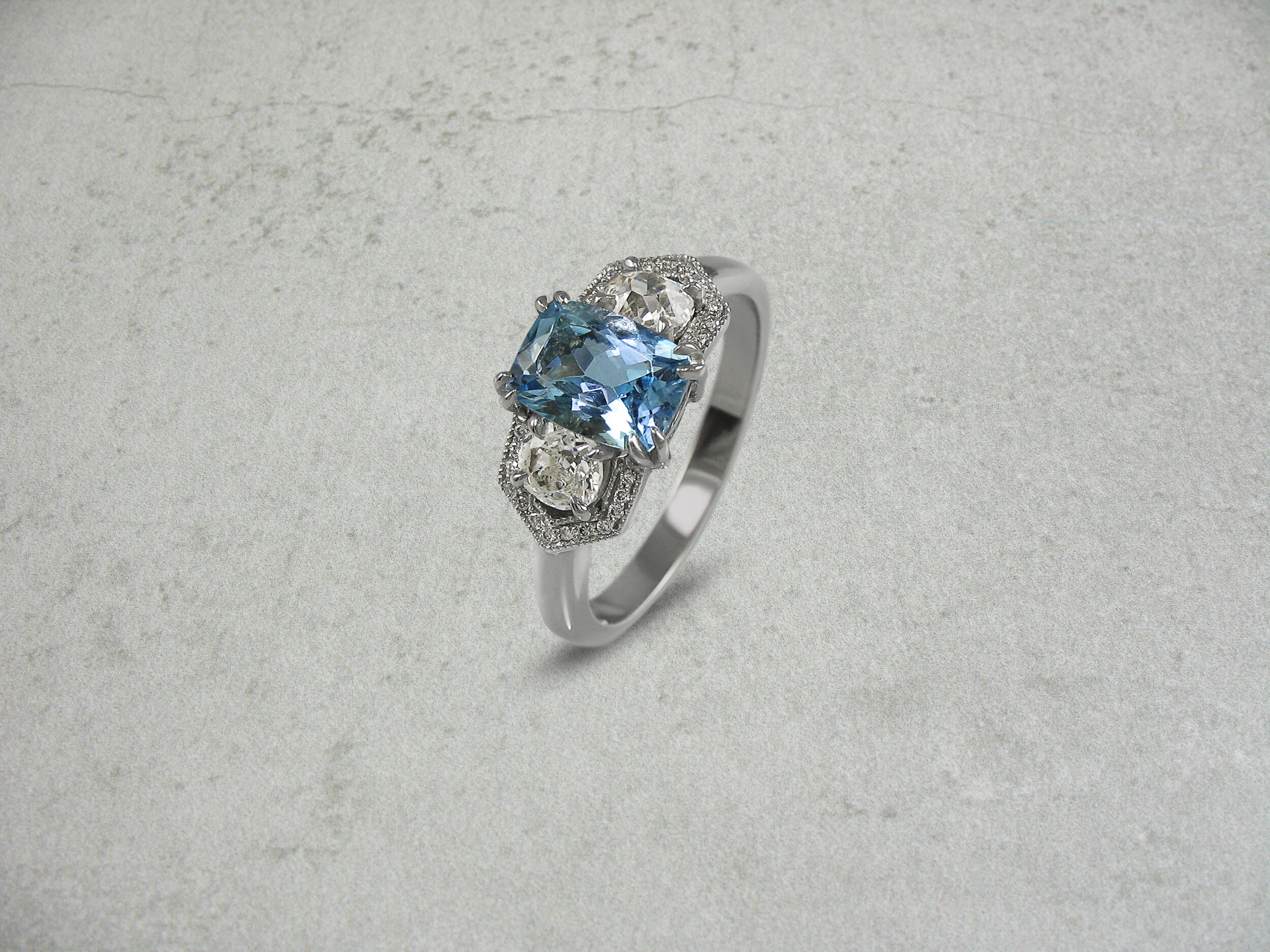 Vintage style aquamarine band diamond engagement ring