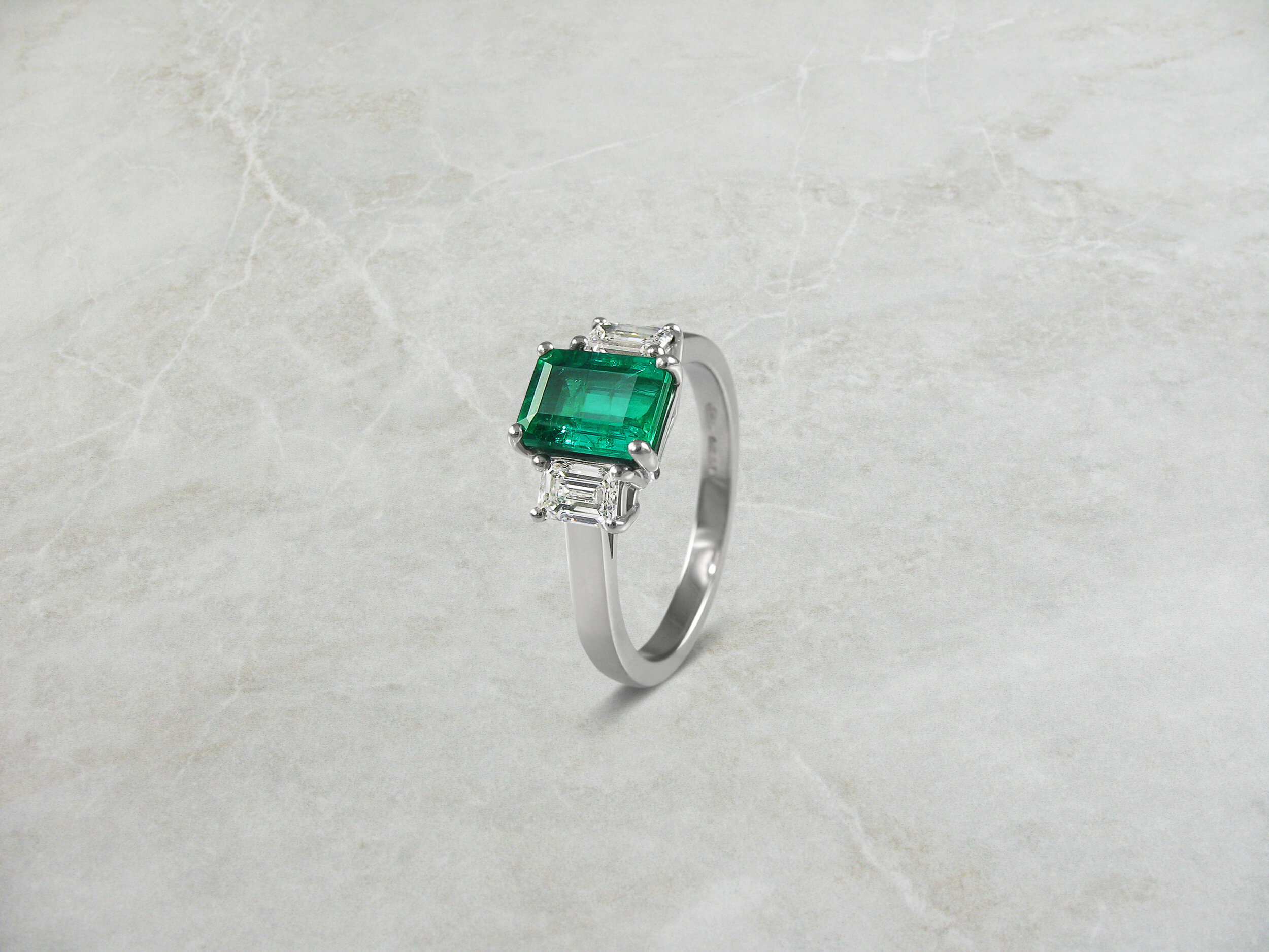 Emerald and diamond trilogy ring