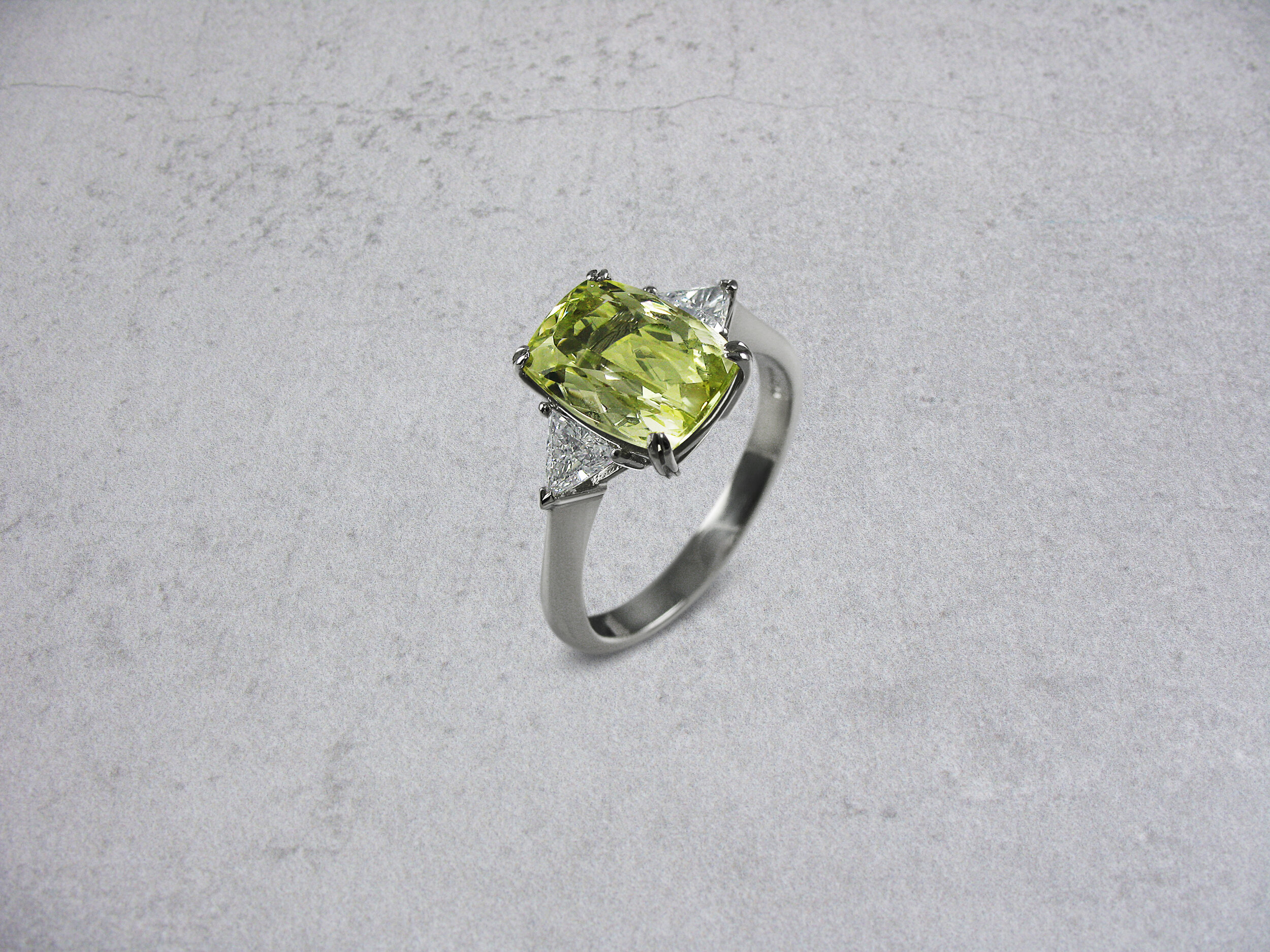 Yellow beryl and trilliant diamond ring