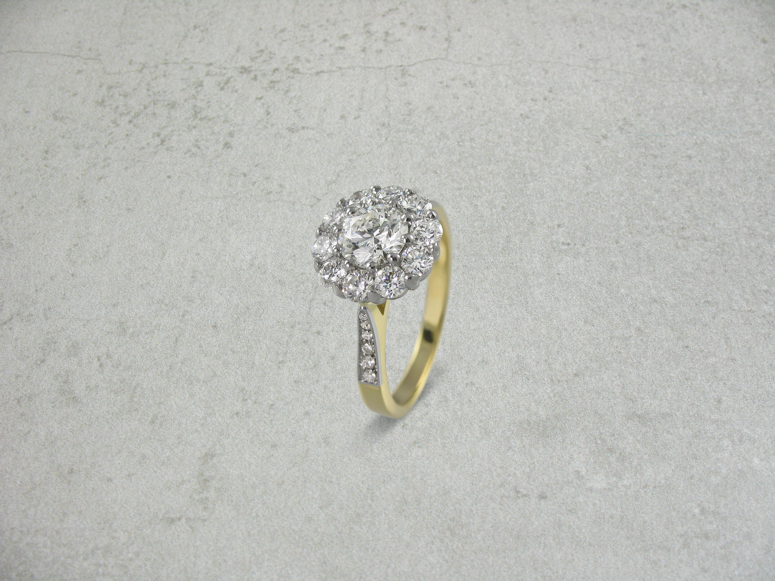 Diamond cluster engagement ring