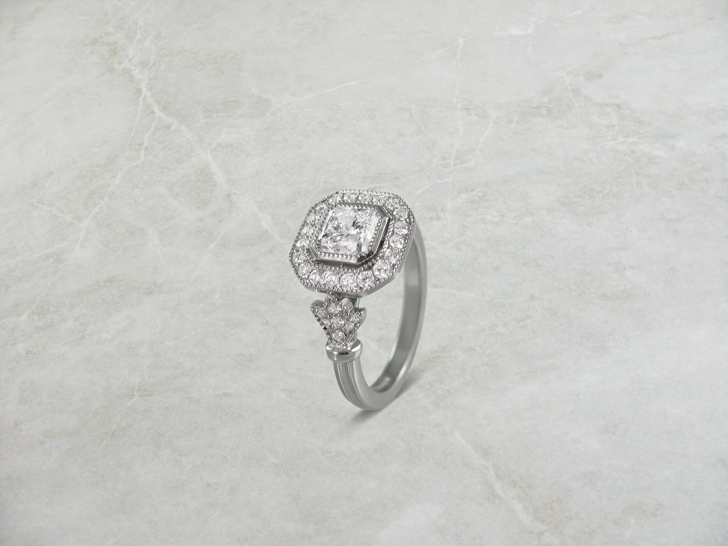 Vintage inspired diamond halo ring