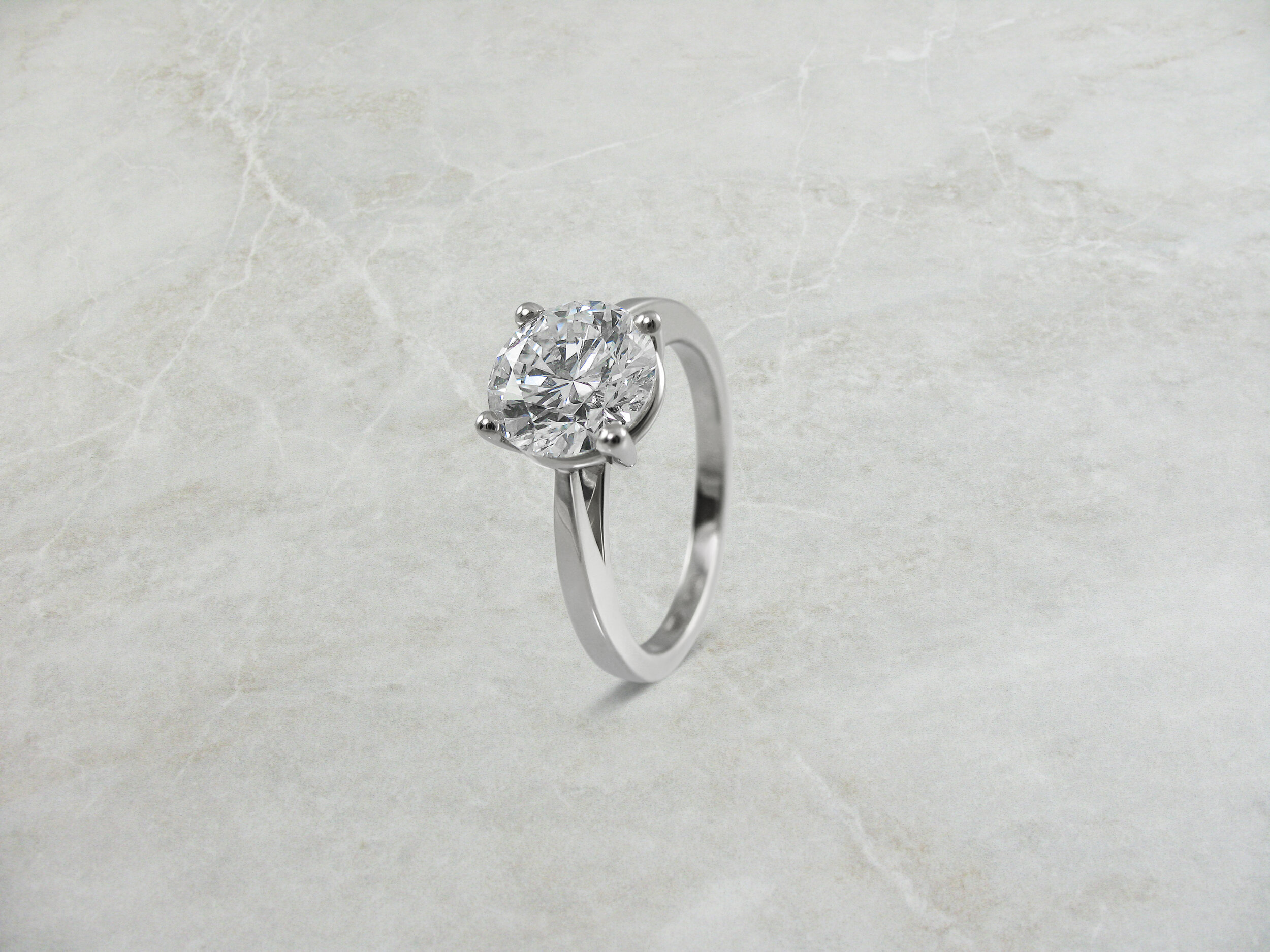 Classic solitaire diamond engagement ring