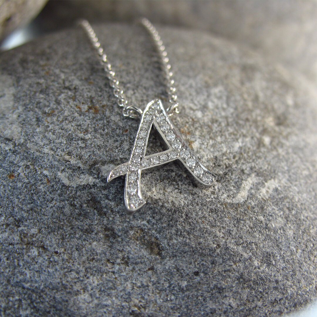 Diamond letter pendant