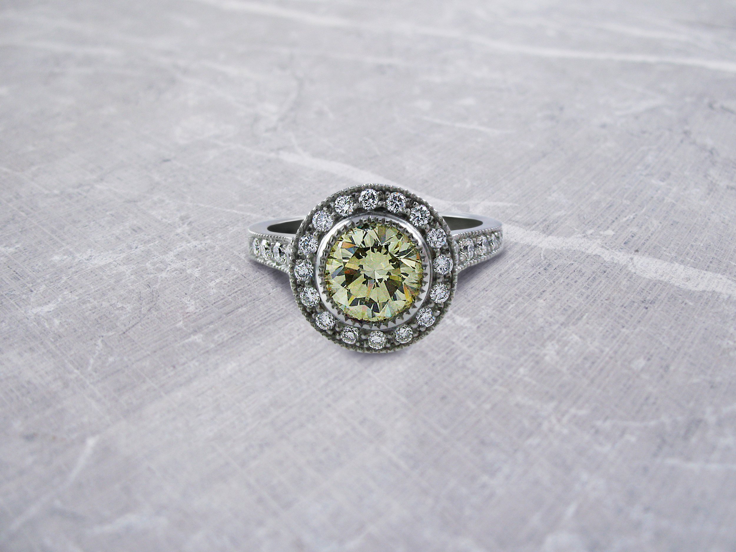 Natural fancy yellow diamond halo engagement ring