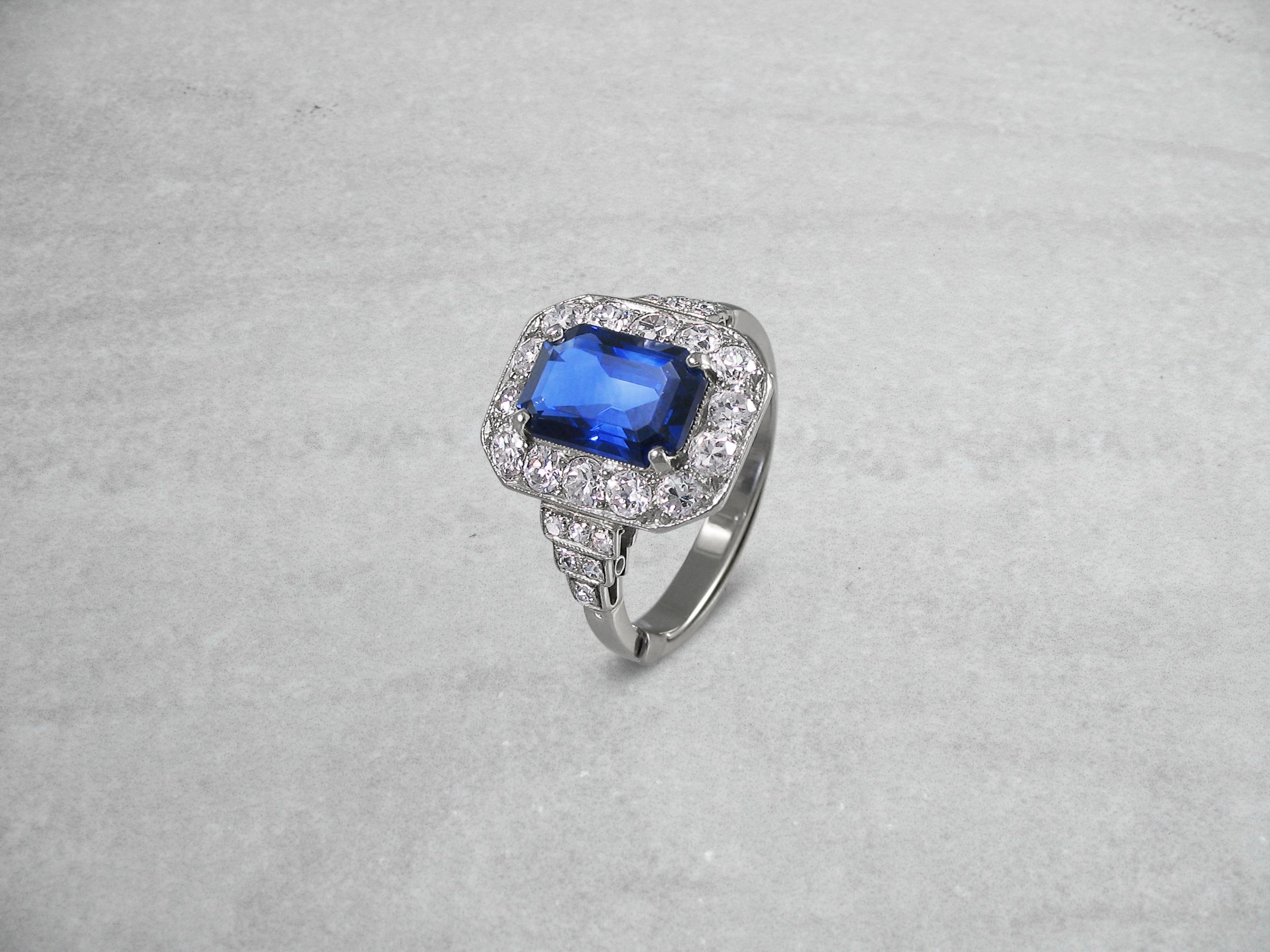 Art deco style with a step cut sapphire