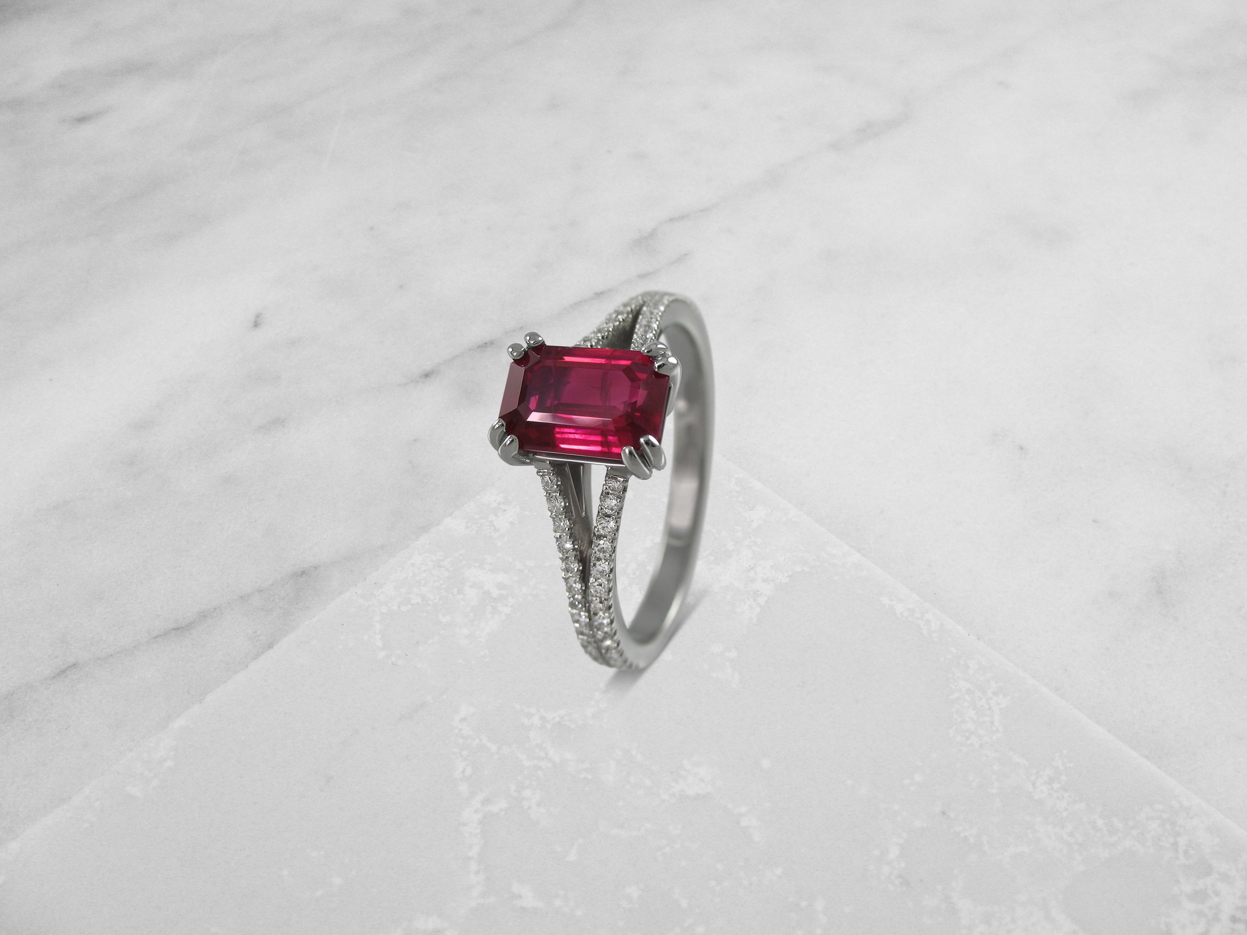 Ruby split shank double claw engagement ring