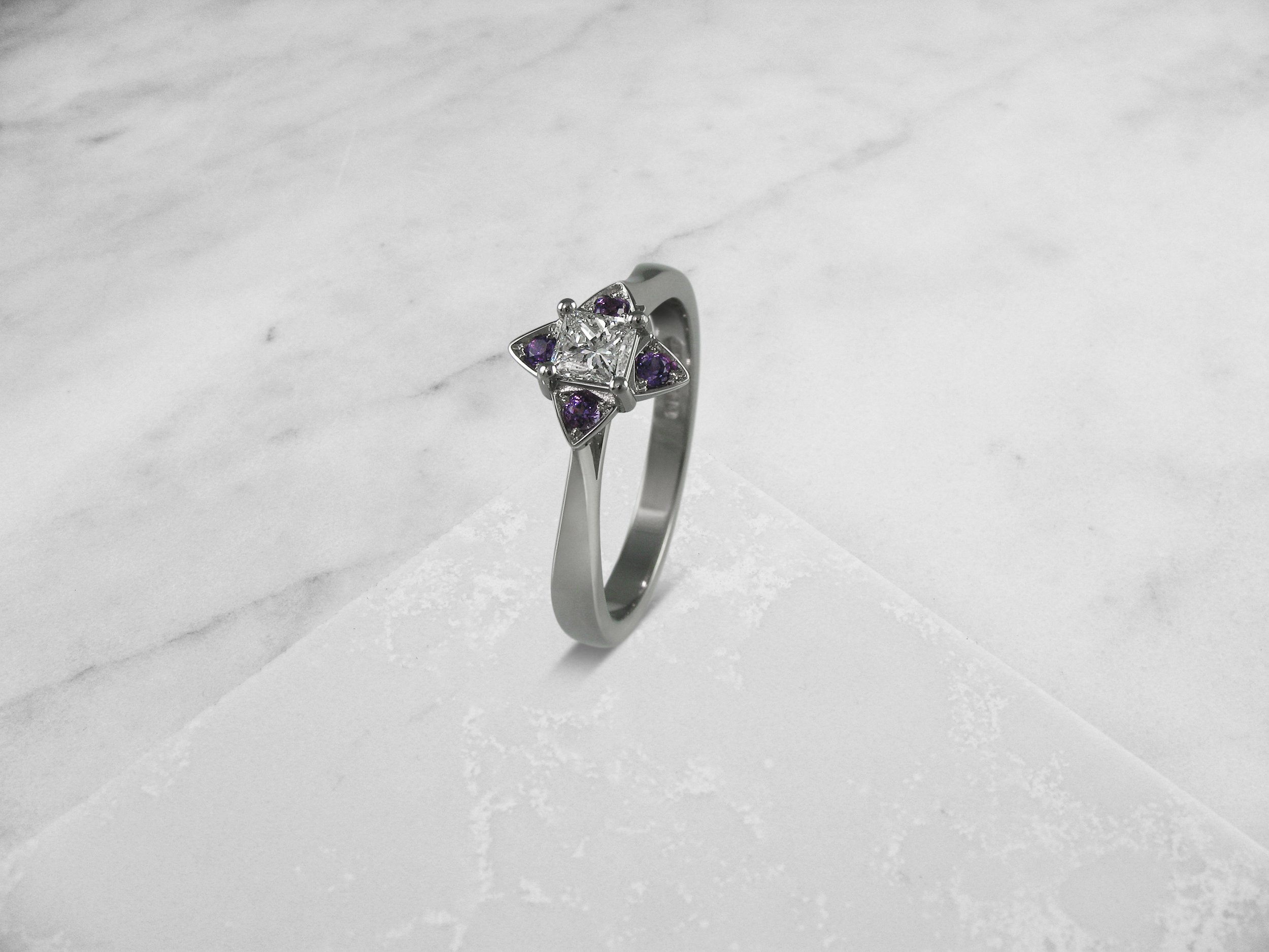 Purple sapphire and diamond flower cluster ring