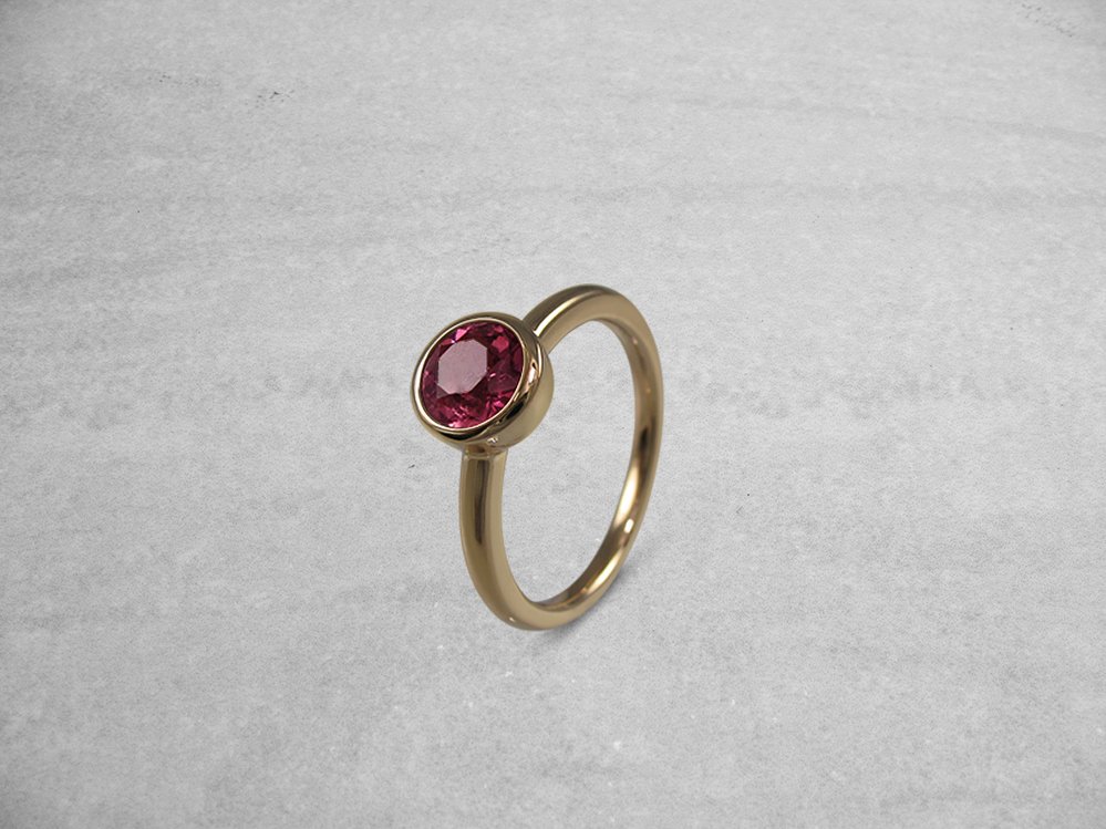 Simple pink sapphire ring