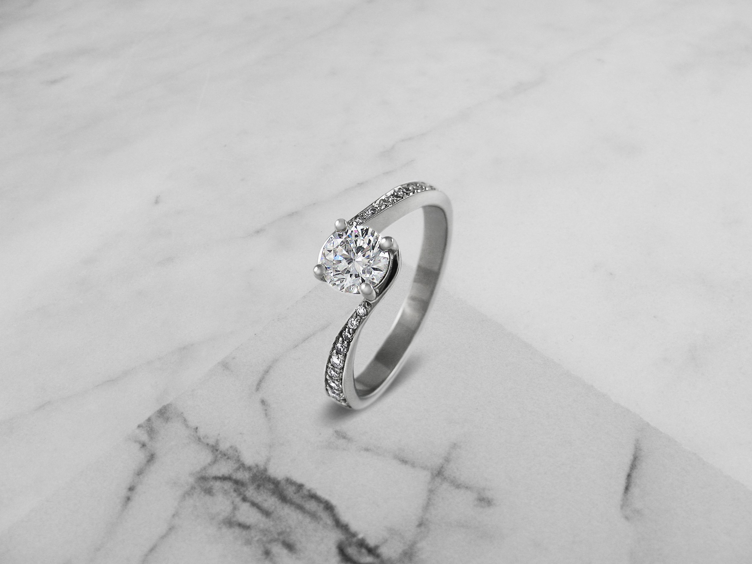 Twist band diamond engagement ring