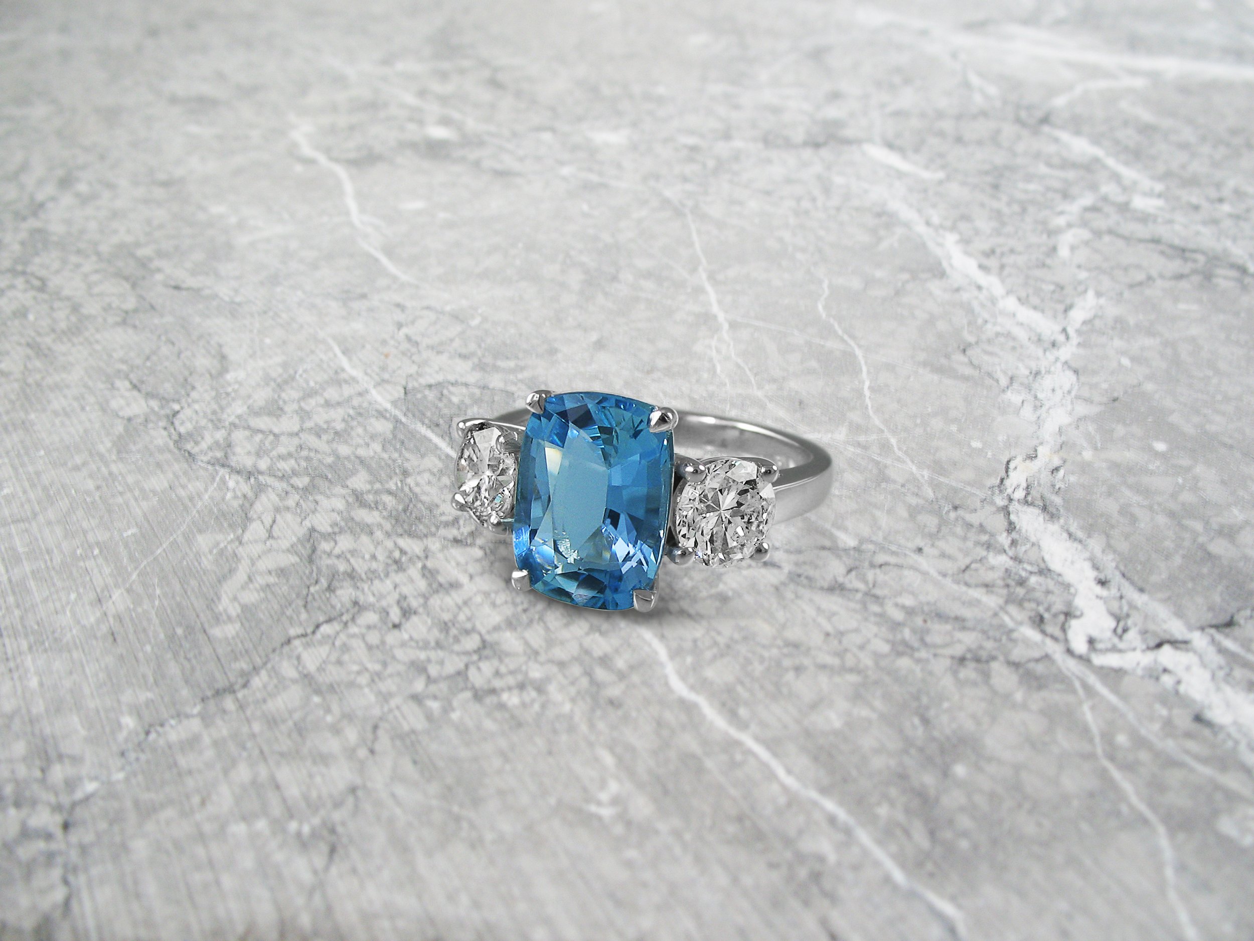 Vintage style aquamarine band and diamond engagement ring