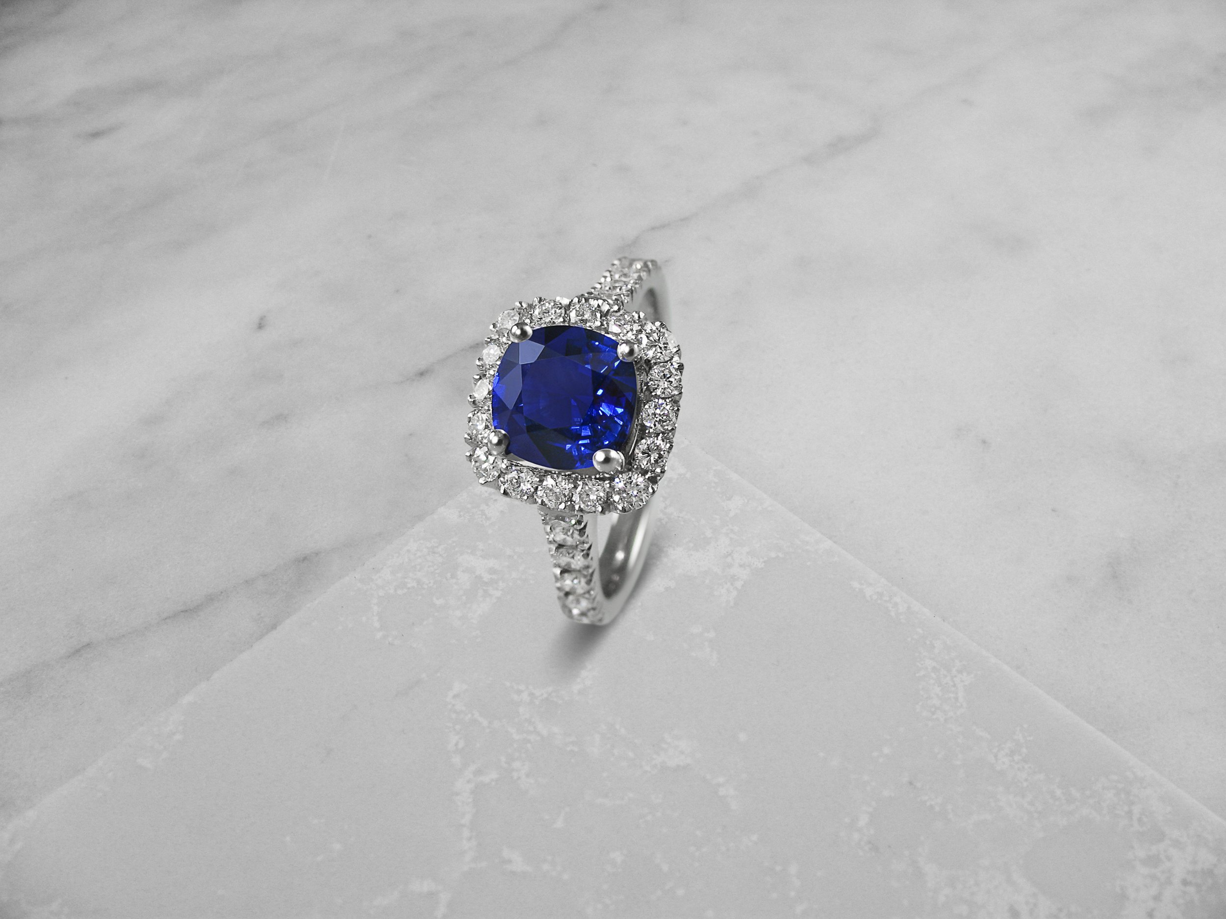 Cushion shaped sapphire halo engagement ring.jpg