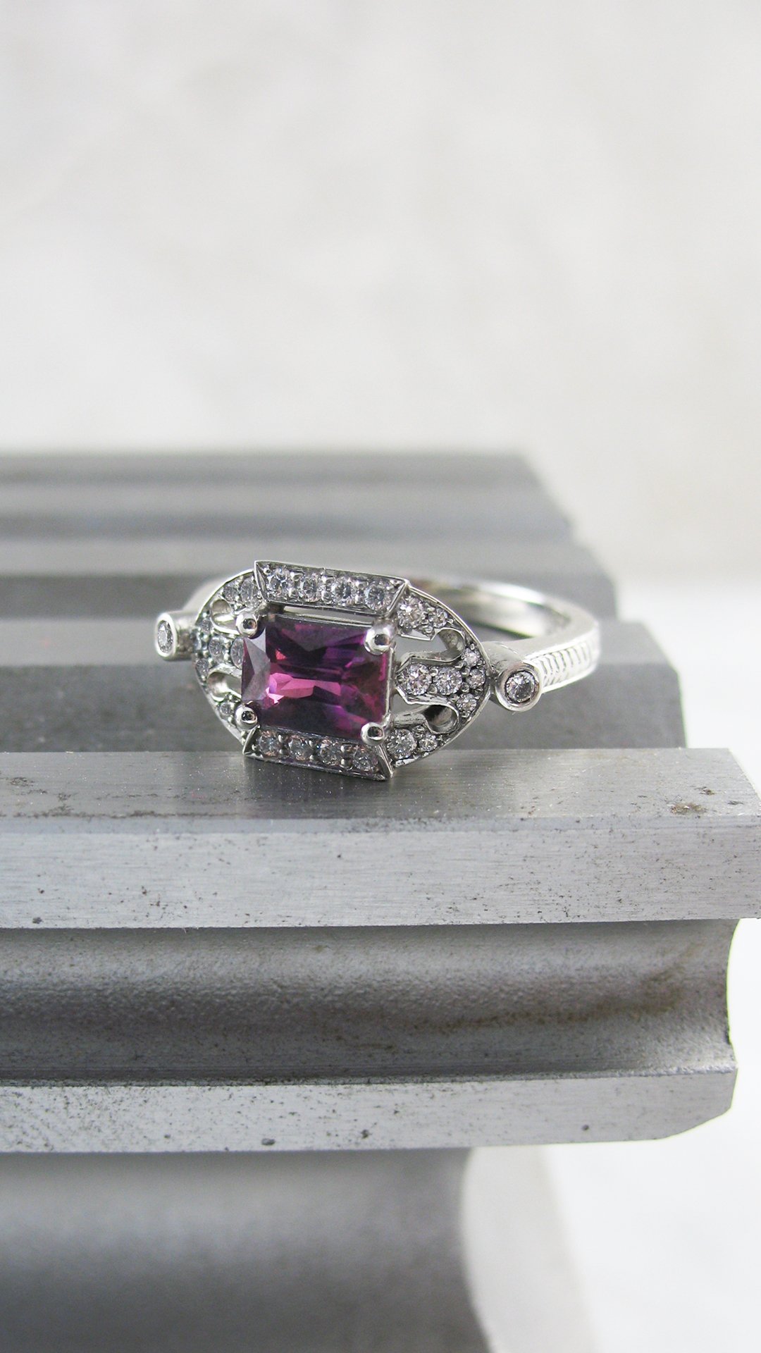 An attractive purple sapphire Art Deco style ring