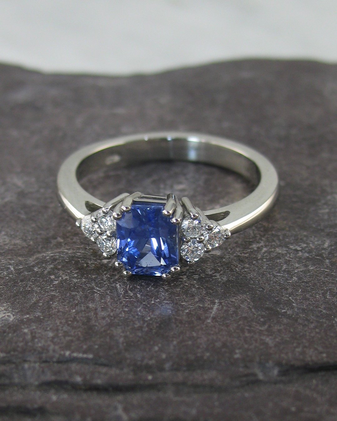 A trefoil sapphire and diamond engagement ring 