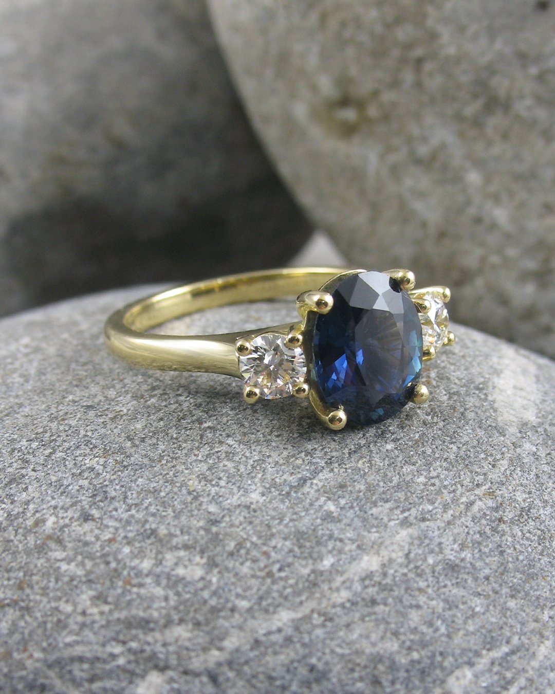 A stunning bespoke teal sapphire ring