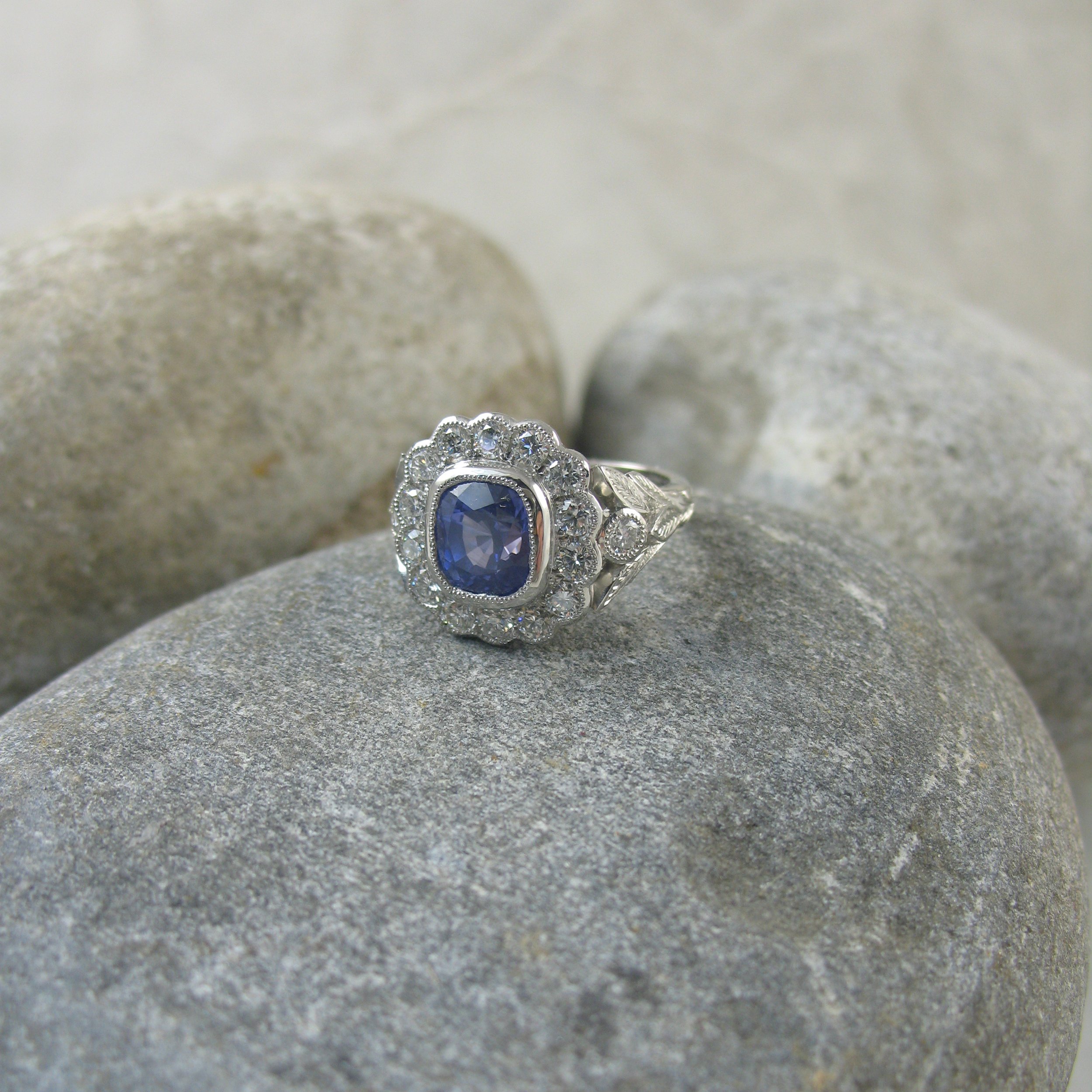 A beautiful vintage inspired bespoke sapphire halo ring