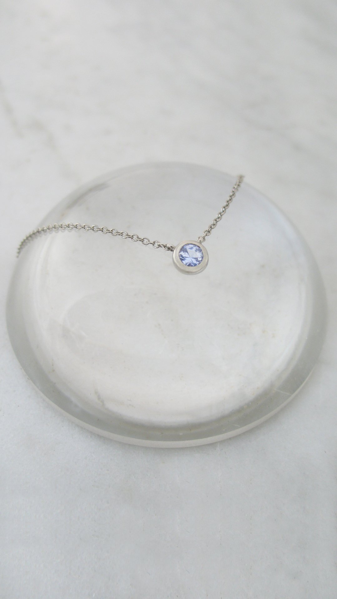 A classic rose cut solitaire sapphire pendant