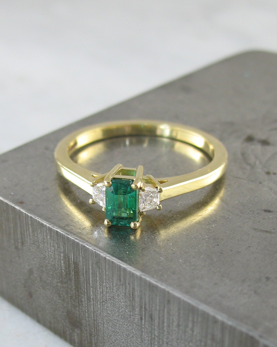 A unique emerald trilogy ring 
