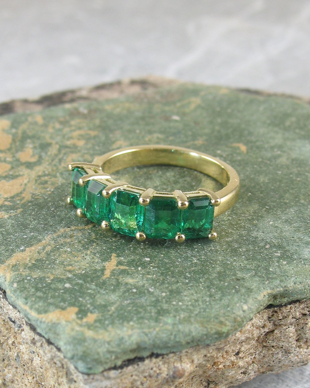 A beautiful five stone emerald ring