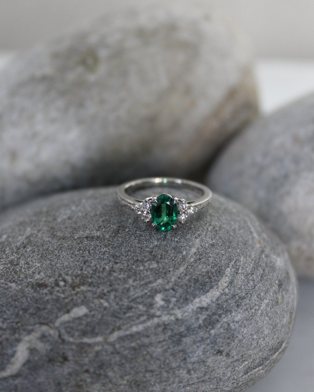 A Colombian emerald engagement ring