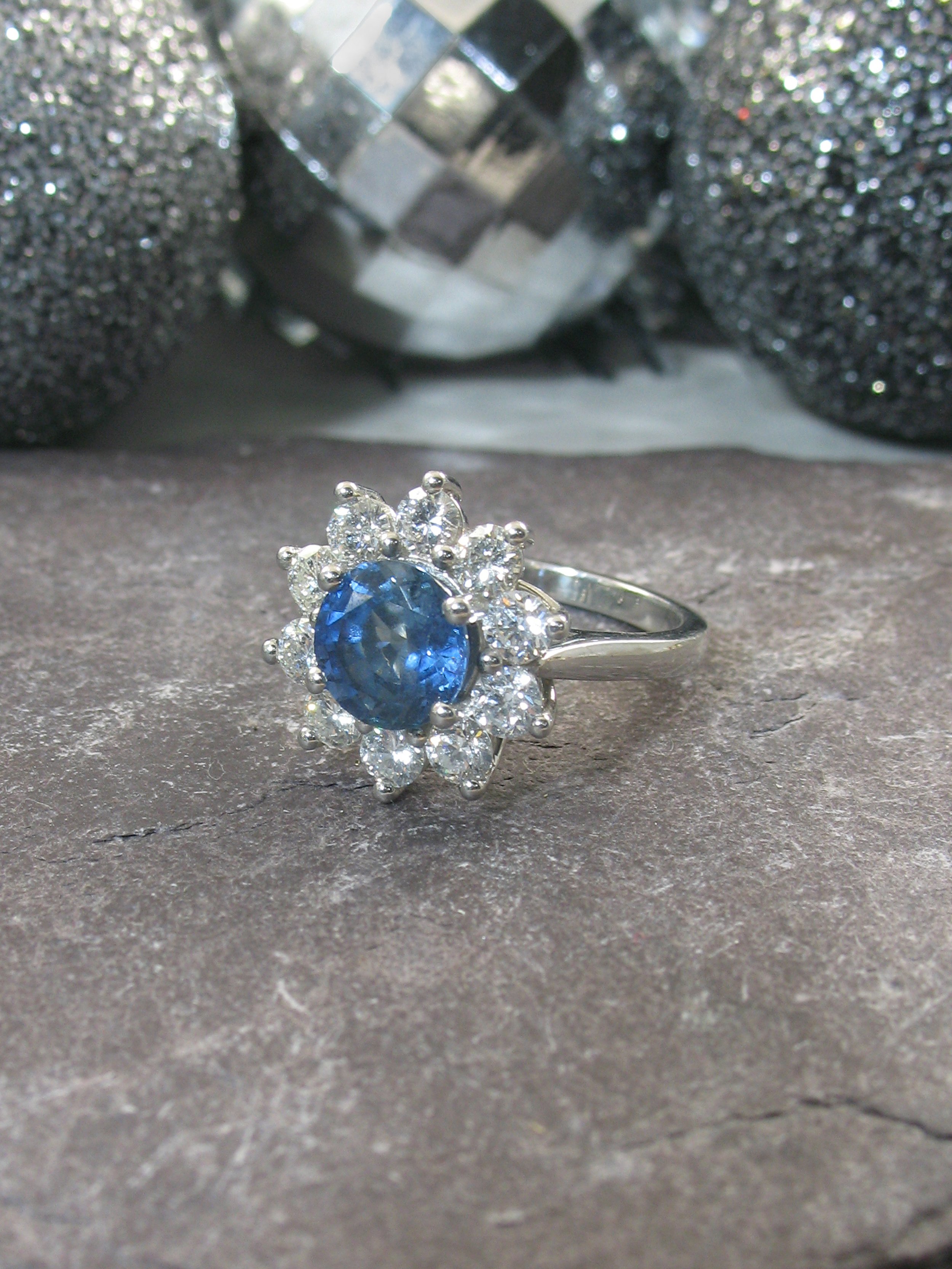 A vintage inspired bespoke sapphire cluster ring