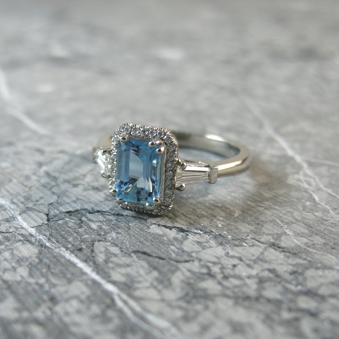 A custom diamond and  aquamarine engagement ring