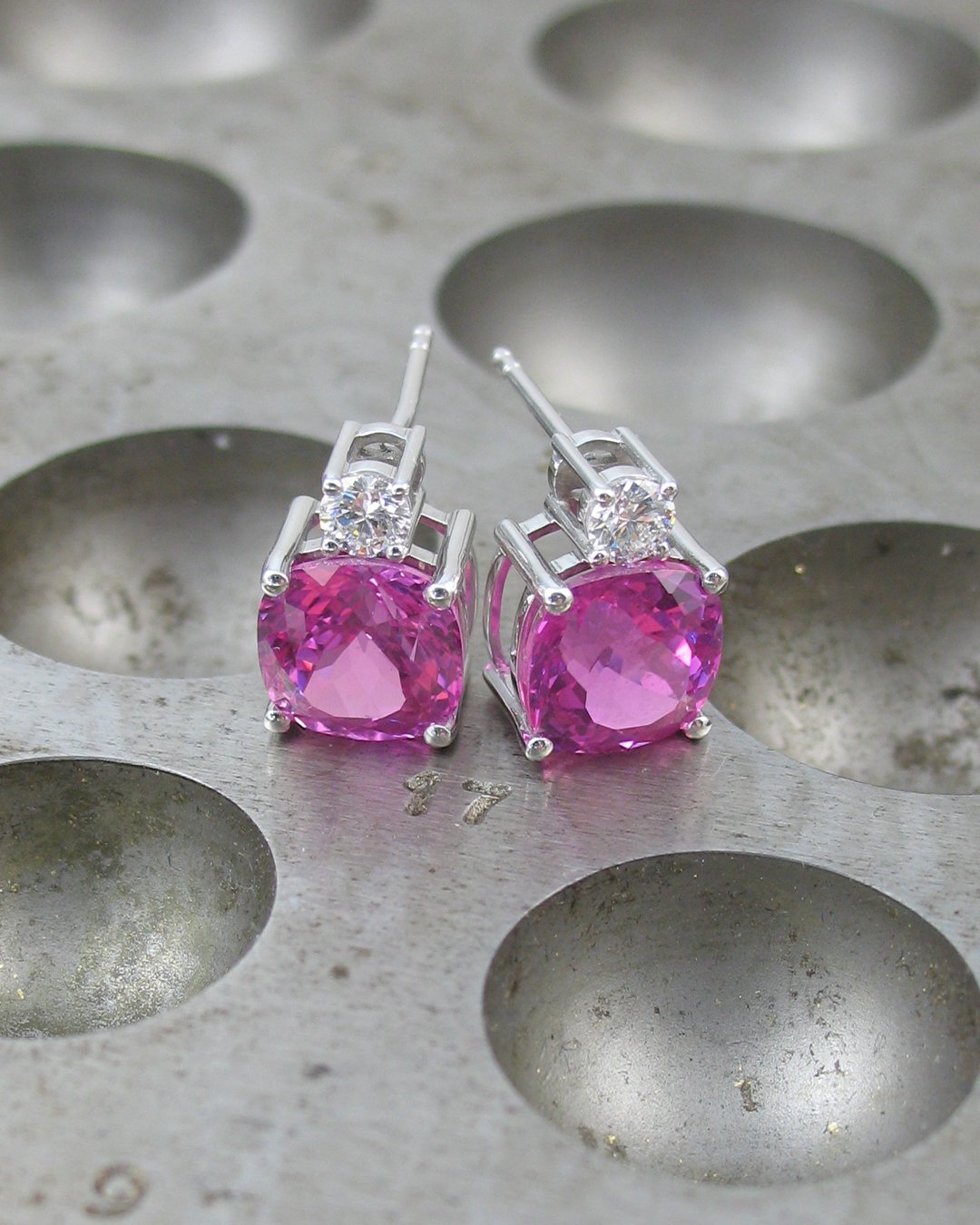 A beautiful pair of vibrant pink sapphire earrings
