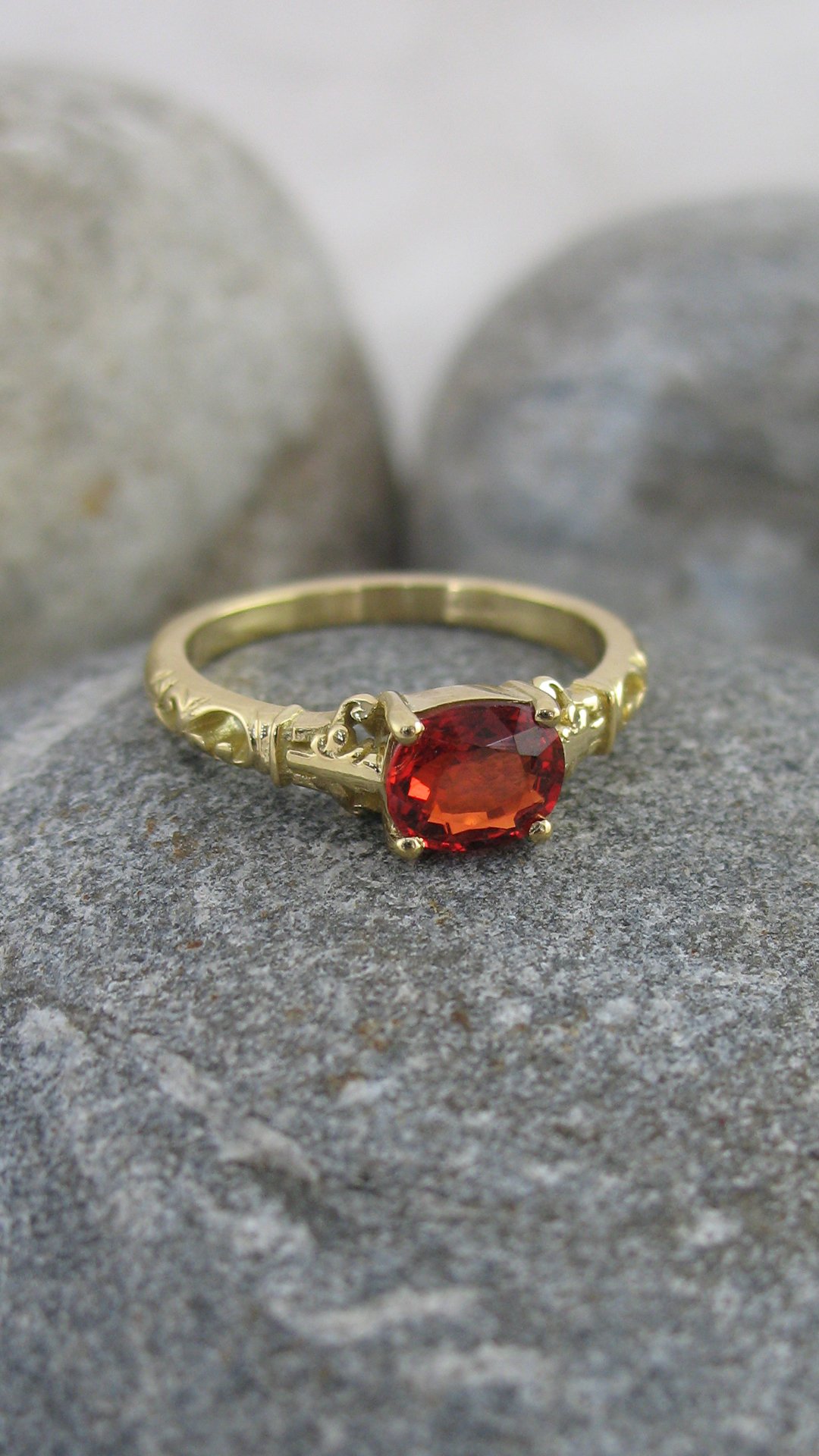 A vibrant cushion shaped red spinel ring