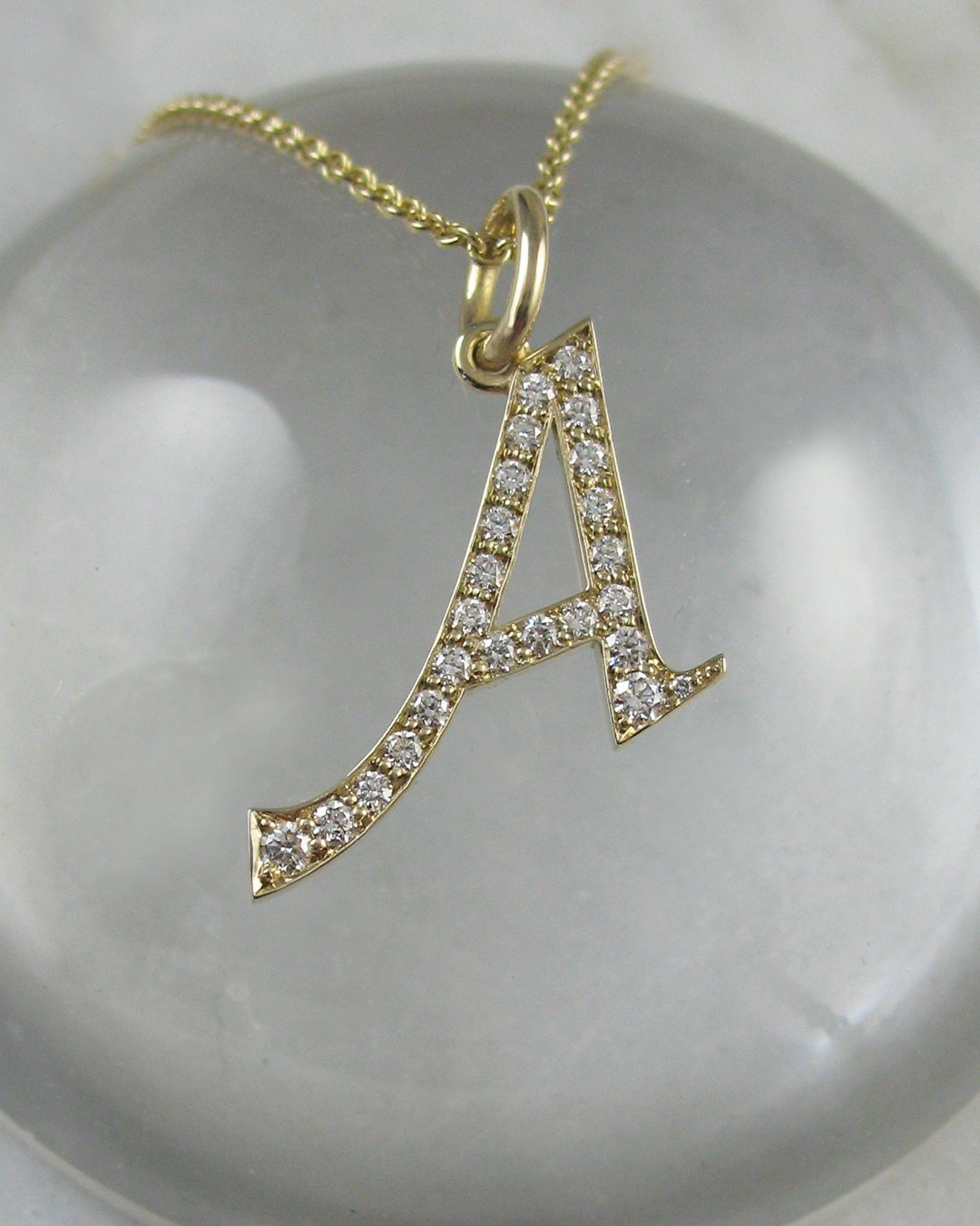 An elegant custom diamond letter necklace