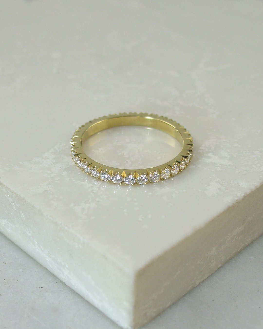 A timeless and versatile full eternity diamond ring.