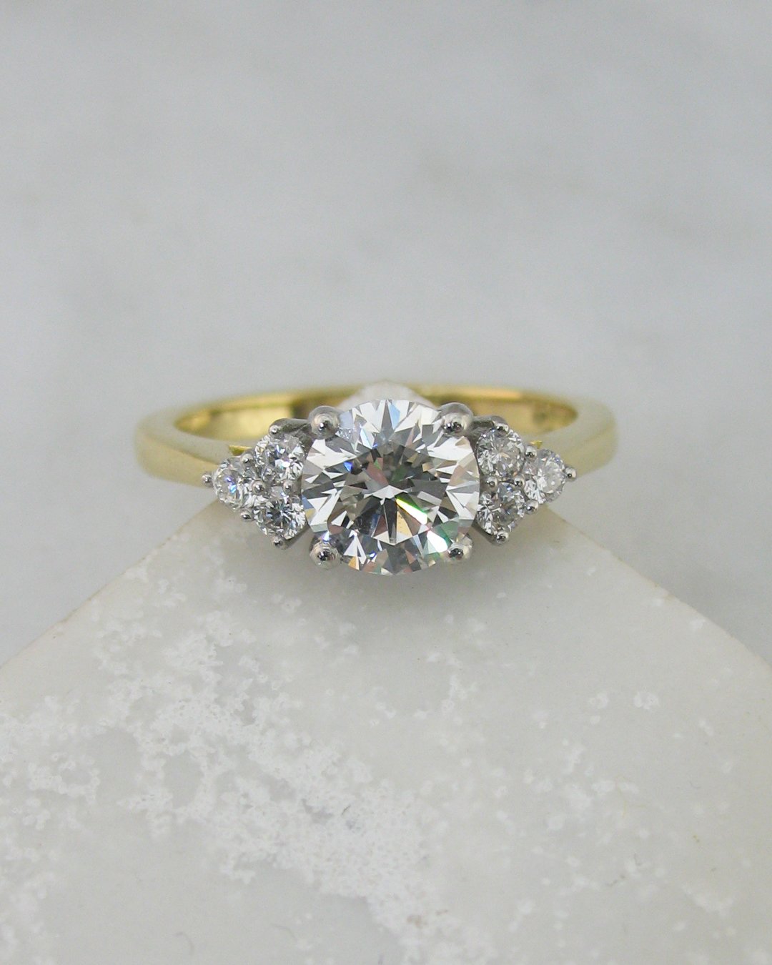 A timeless classic treoil diamond engagement ring.jpg