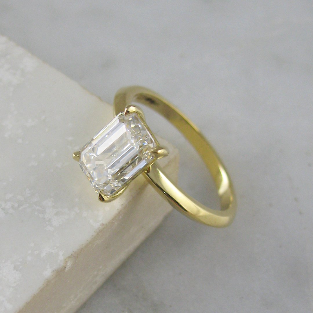 An emerald cut diamond engagement ring.jpg