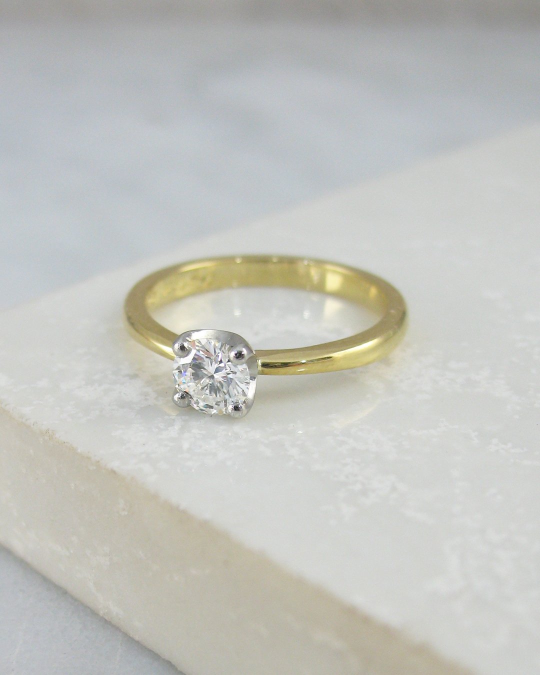A simple diamond solitaire engagement ring
