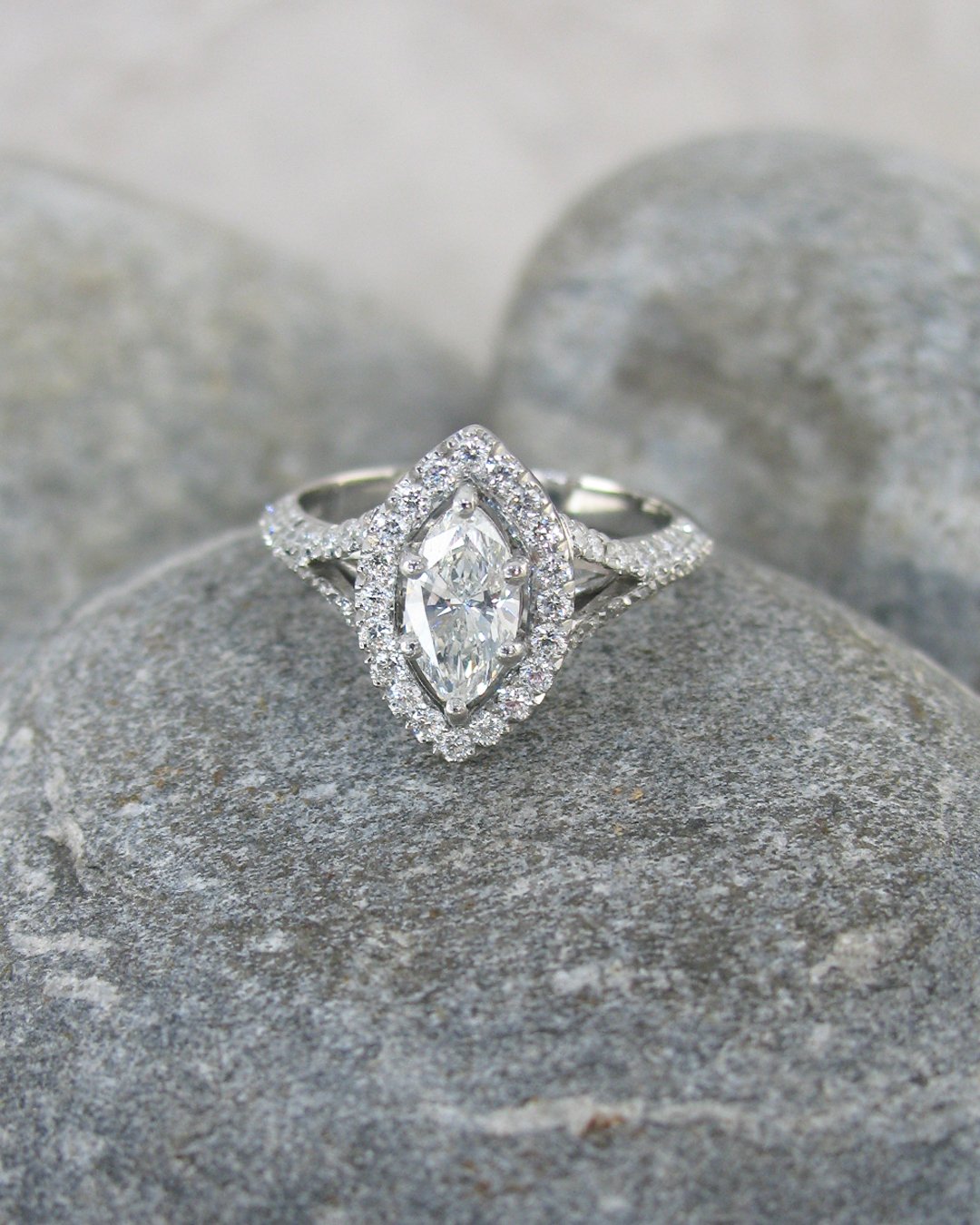 A bespoke marquise diamond halo ring