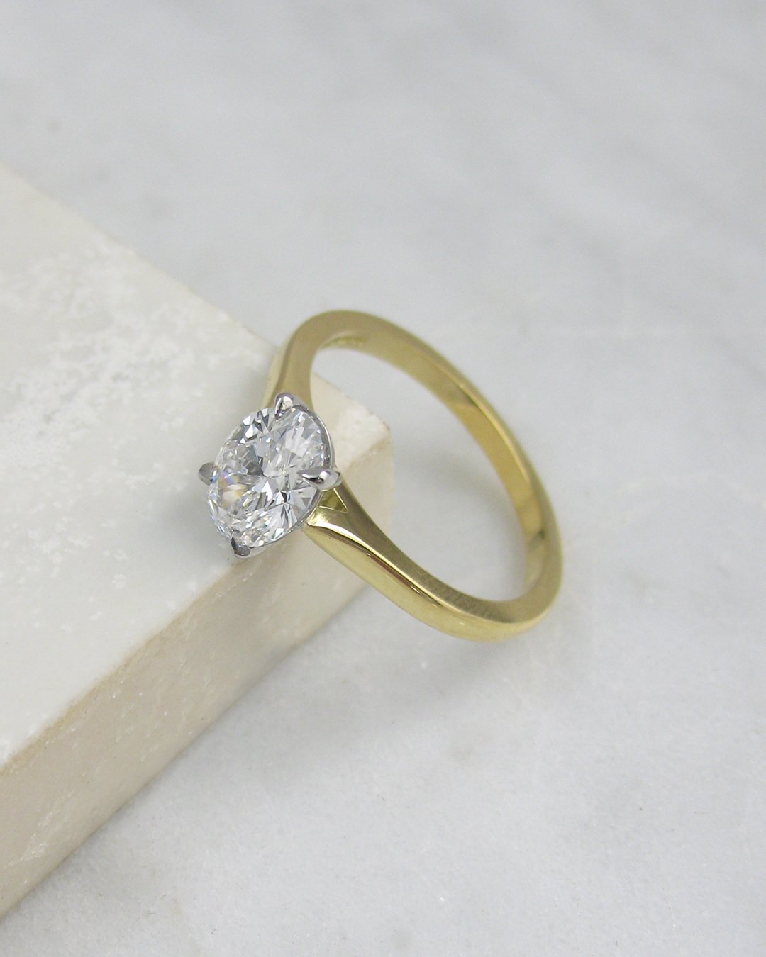 An oval cut diamond engagement ring