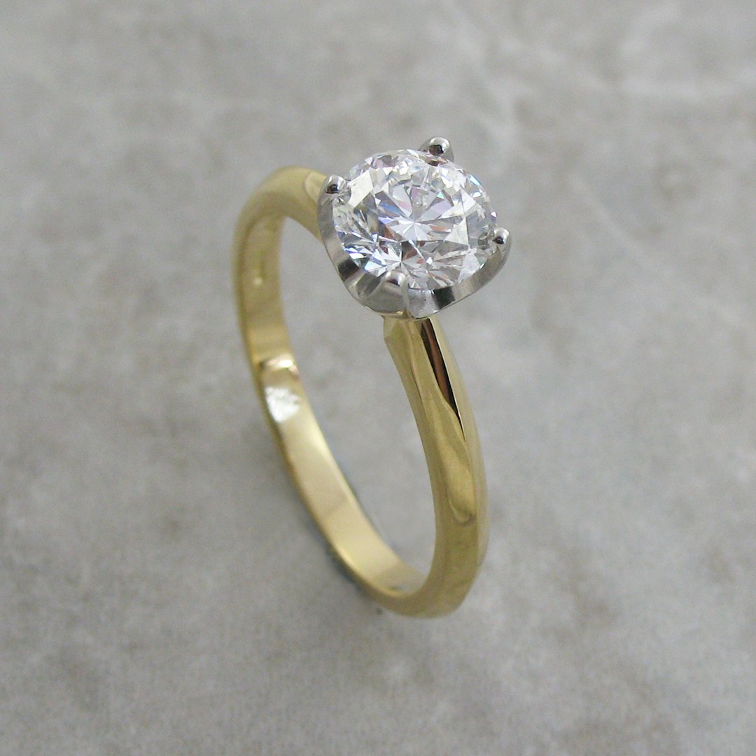 A beautiful custom solitaire diamond engagement ring