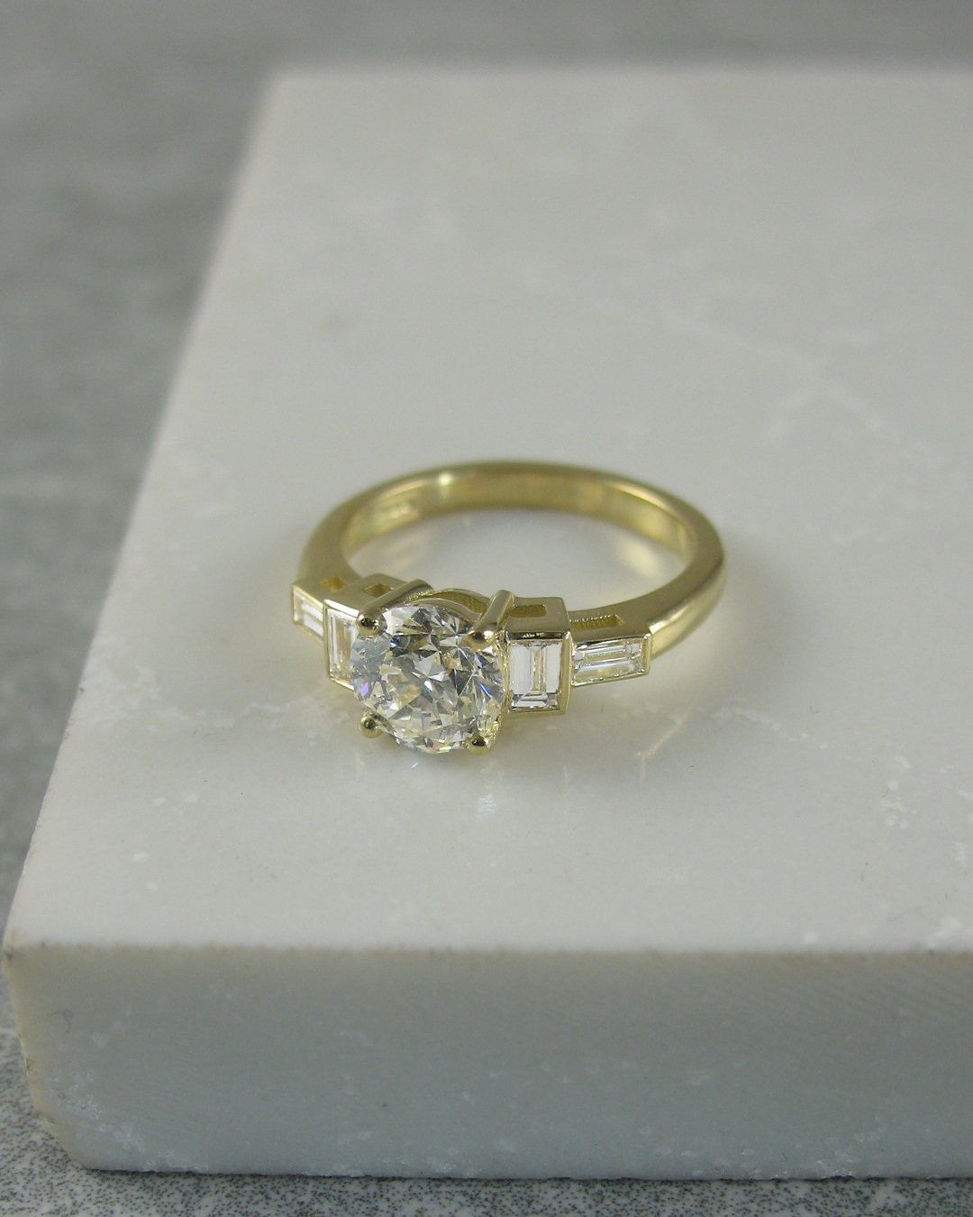 A modern geometric shaped diamond engagement ring