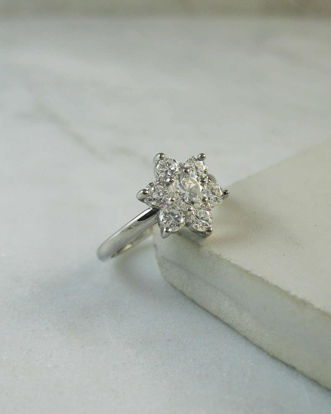 A beautiful floral shaped diamond cluster ring