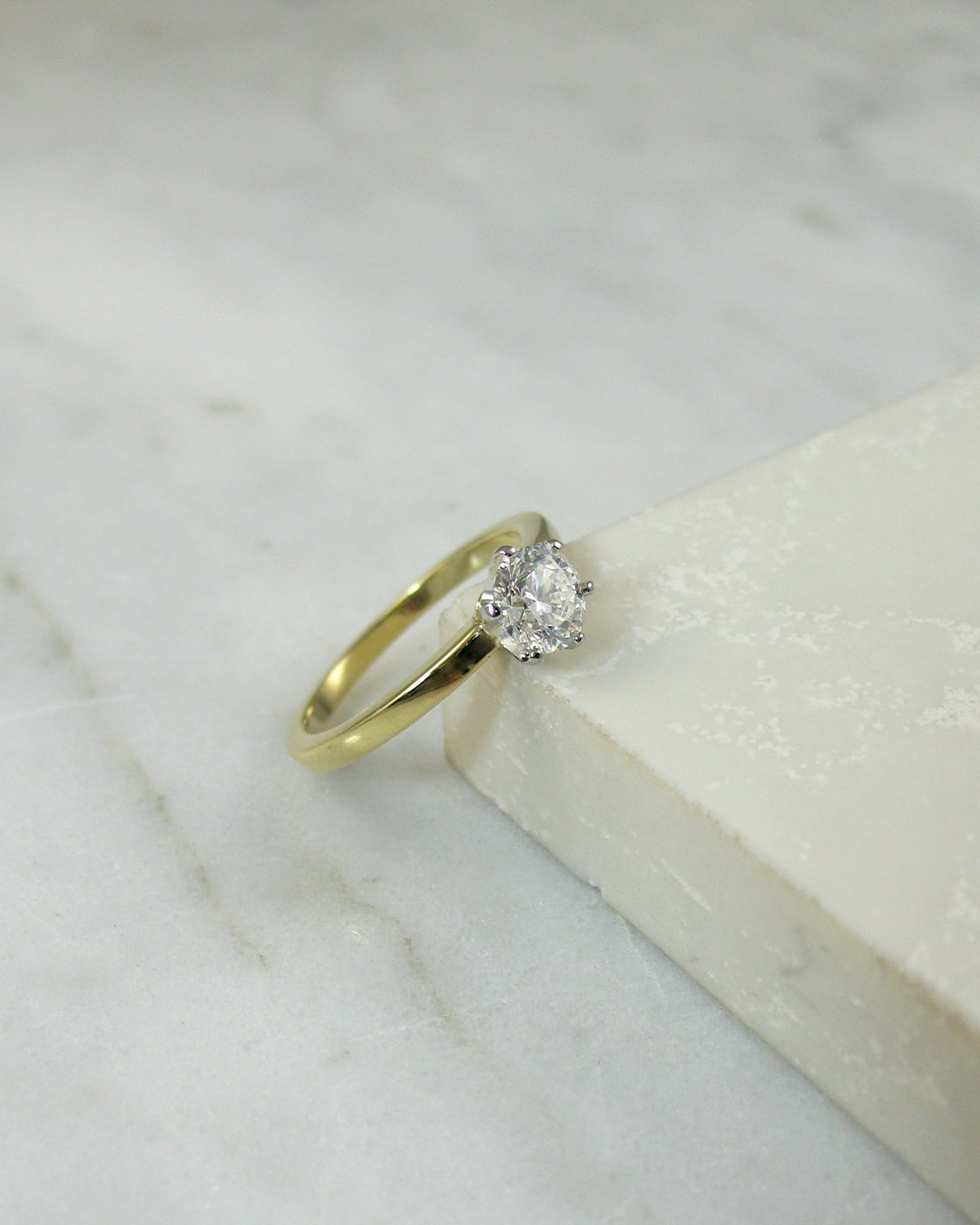 A mininalist bespoke diamond engagement ring