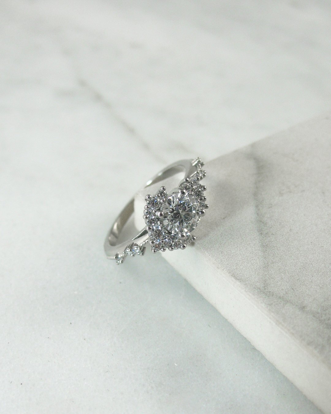 A custom diamond cluster ring