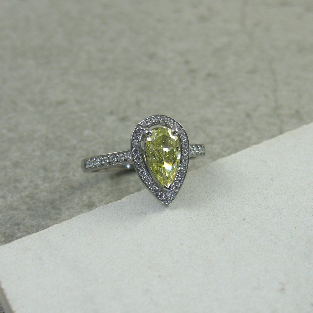 A fancy yellow diamond pear shape