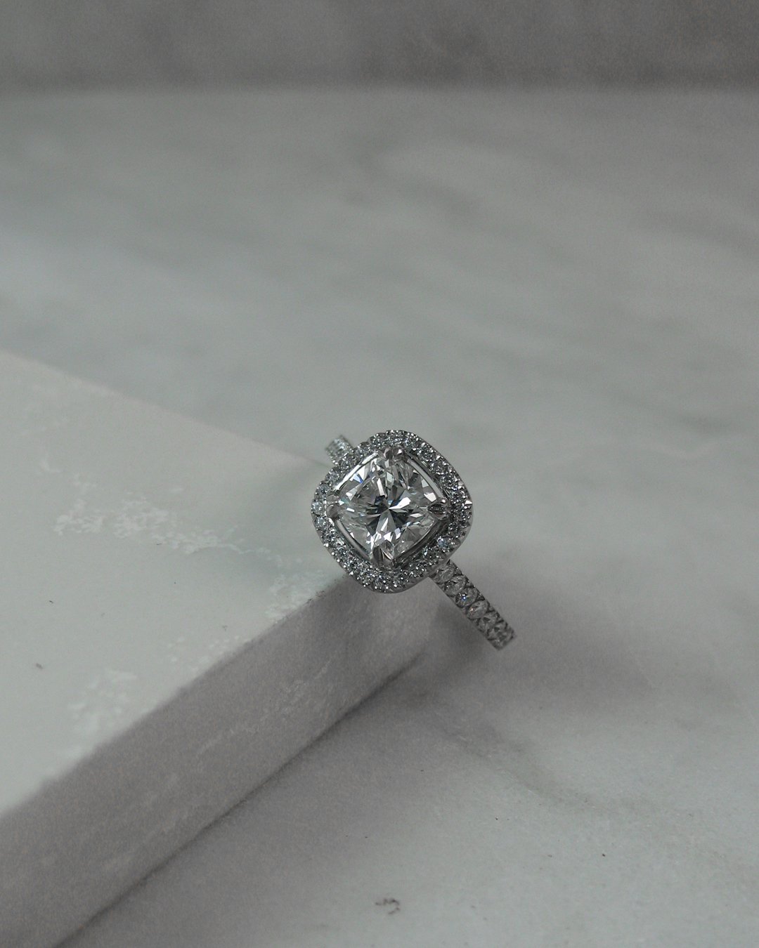 A shimmering bespoke diamond halo ring