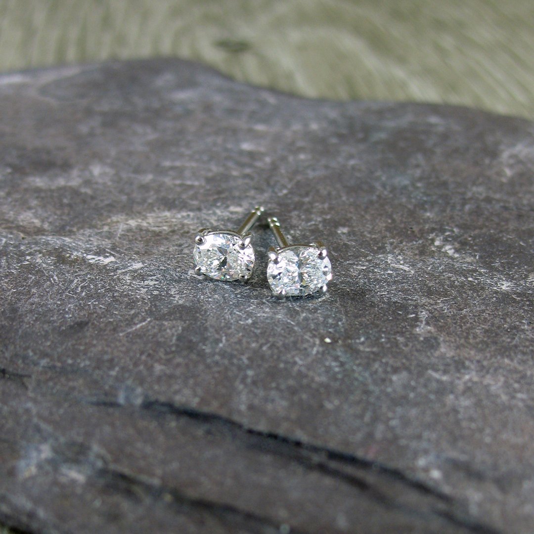 A bespoke pair of platinum diamond stud earrings