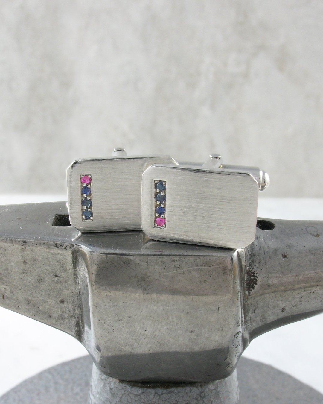 Sterling silver blue and pink sapphire bespoke cufflinks