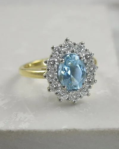 Aquamarine and diamond cluster engagement ring 18ct yellow gold.jpg