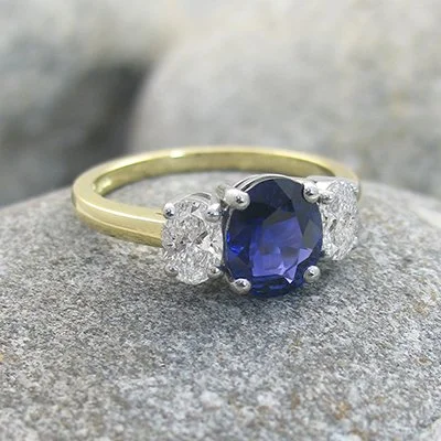 Oval sapphire and oval diamond ring platinum setting yellow gold shank.jpg